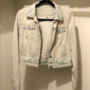 Distressed light blue denim jacket